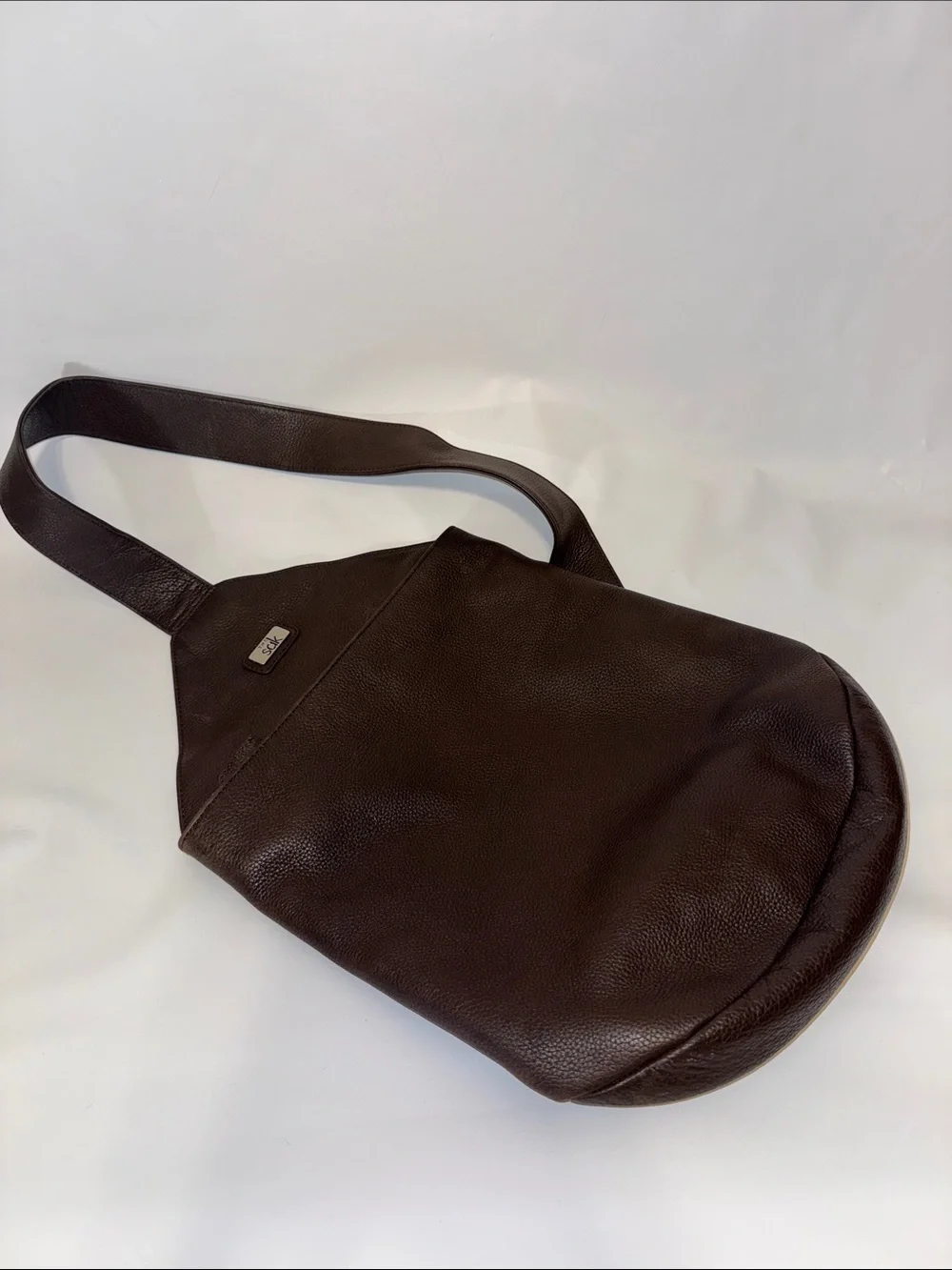 The Sak Vintage Brown Pebbled Leather Tear Drop Sling Bag Backpack